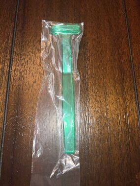 Green Plastic Tongue Scraper Cleaner